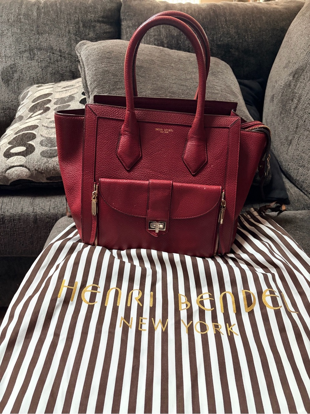 henri bendel deep red pebbled leather tote with front pocket